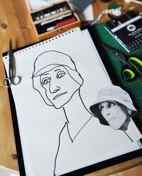Zeichenblock, Collage eines Frauenkopfes mit Hut, Schere und Farbstifte