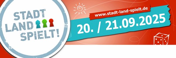 Banner für "Stadt-Land-Spielt!" in der Stadtbücherei Schleswig. 